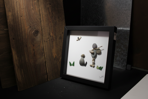 Boy Fishing with Dog Pebble Art by Amy
