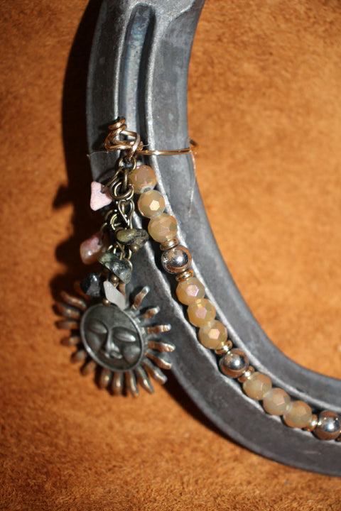 Live Lucky Decorative Horseshoe with Bronze Sun Face Charm and Earthtone Beads