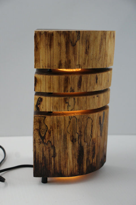 Natural Wood Glow Lamp – Stacked Dark Edition

 by Rustic Log Creations
