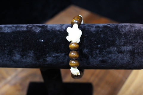 Ivory Turtle Elastic Wood Bead Bracelet by Theiss Tye Dye Studio