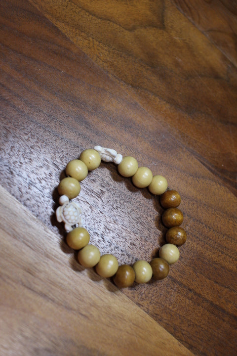 Ivory Turtle Lt Brown Wood Bead Bracelet by Theiss Tye Dye Studio