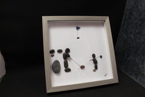A Man and Son on the COurse Pebble and Stone ARt by at by Amy