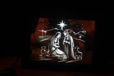 Light up Box depicting Mary Joseph and Jesus under the sky