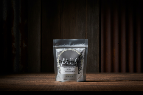 Dry shampoo package on a wooden surface with a dark background