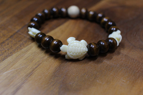 Ivory Turtle Elastic Wood Bead Bracelet by Theiss Tye Dye Studio