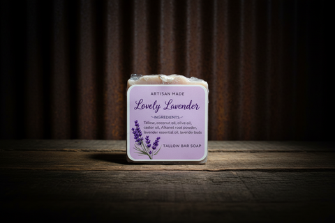 Bar of soap with a 'Lovely Lavender' label on a wooden surface