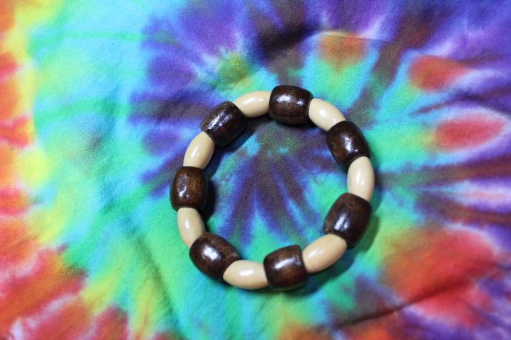 Brown Barrel and Tan Oval Wood Bead Bracelet by Theiss