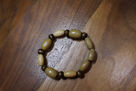 Tan Oval Bead w/brown round bead Bracelet by Theiss