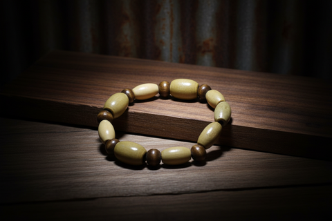 Tan Oval Bead w/brown round bead Bracelet by Theiss