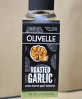 Olivelle roasted garlic balsamic vinegar bottle with label on a beige background