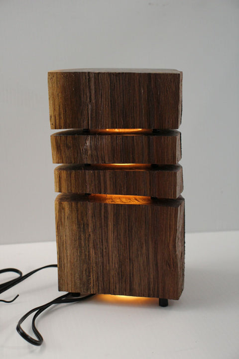 Natural Wood Glow Lamp – Stacked Dark Edition

 by Rustic Log Creations