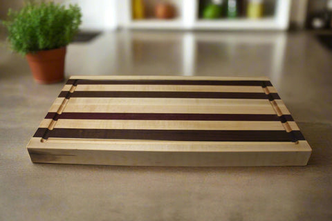 Striped Maple, Walnut, and Padauk Cutting Board with Juice Groove