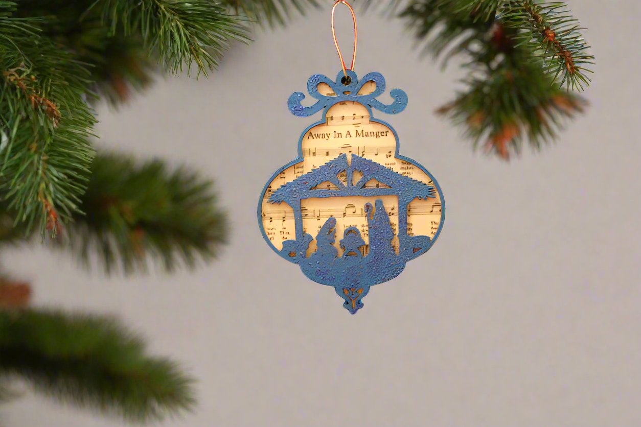 Away In A Manger Blue Ornament by Sheri Gulla