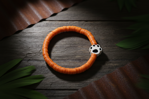 Solid Orange Beaded Stretch Bracelet with Paw Print Charm  by Beaded Beauties
