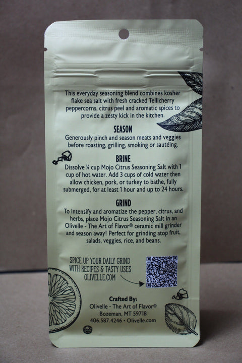 Product packaging with text and a QR code on a plain background