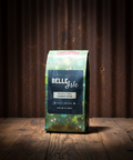 Belle Isle coffee bag on a wooden surface with a dark background