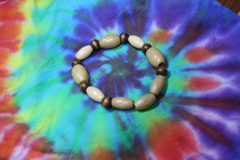 Tan Oval Bead w/brown round bead Bracelet by Theiss