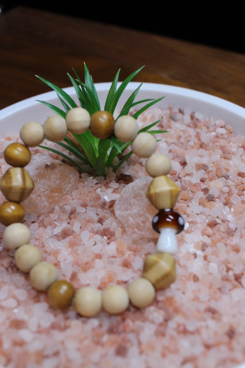 Brown Mushroom w/ Tan round and Bi-cone wood beads Bracelet by Theiss