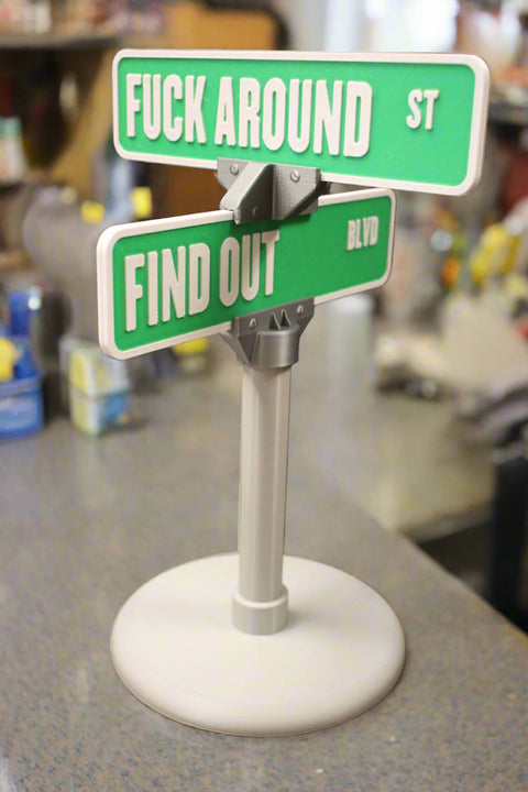 10-Inch Tall Miniature Intersection Sign: "Fuck Around St" and "Find Out Blvd" - Green and White with Gray Post Base