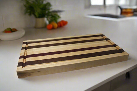 Striped Maple, Walnut, and Padauk Cutting Board with Juice Groove