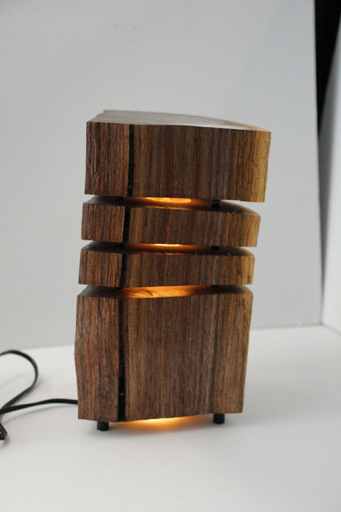 Natural Wood Glow Lamp – Stacked Dark Edition

 by Rustic Log Creations