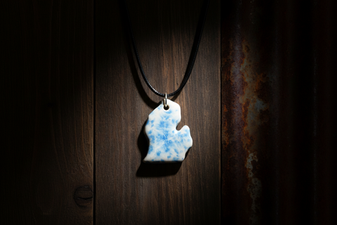 Blue and White Michigan-Shaped Ceramic Pendant on Black Cord Necklace