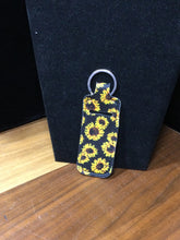 Load image into Gallery viewer, Black Sunflower Lip Balm Holder by Almosta Bee Farm Keychains &amp; Trinkets
