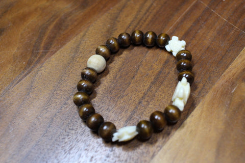 Ivory Turtle Elastic Wood Bead Bracelet by Theiss Tye Dye Studio