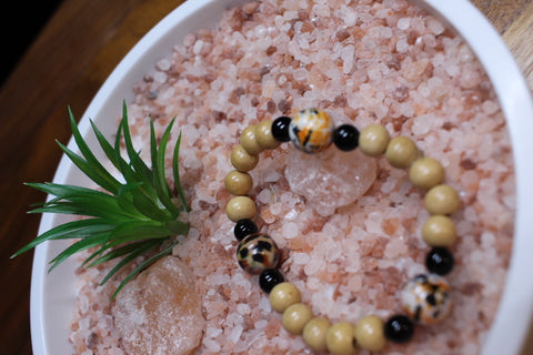 Orange & Black Beads w/ Tan and Black small Wood beads Bracelet by Theiss