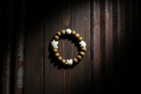Ivory Turtle w/Tan and Lt Brown Wood Beads By Bracelet Theiss Tye Dye Studios