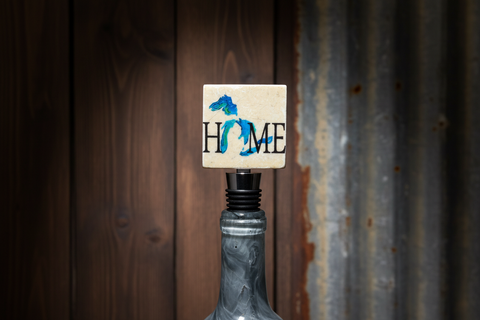 Beige Tile Wine Stopper with "HOME" Text and Blue Great Lakes