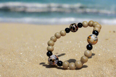 Orange & Black Beads w/ Tan and Black small Wood beads Bracelet by Theiss