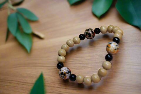 Orange & Black Beads w/ Tan and Black small Wood beads Bracelet by Theiss