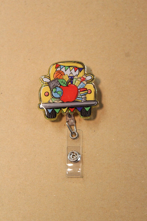 Yellow Truck Teacher Badge Reel with School Supplies Design