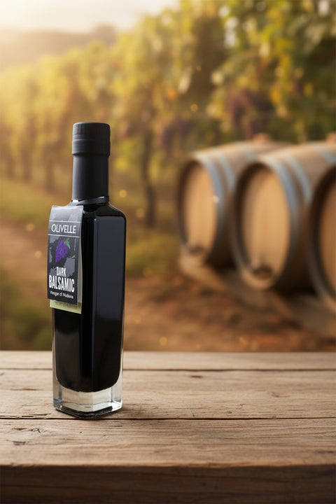 Bottle of Olvelle dark balsamic on a beige background