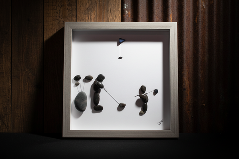 A Man and Son on the COurse Pebble and Stone ARt by at by Amy