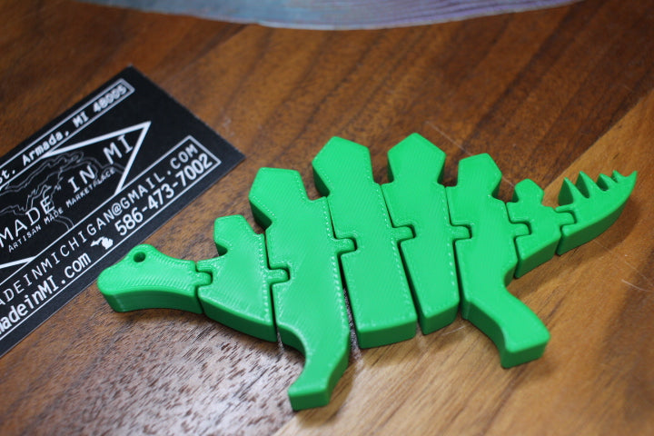 3-D Printed Green Stegosaurus Flexi Animal by AMLinspirations