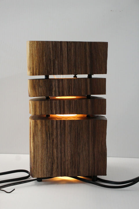 Natural Wood Glow Lamp – Stacked Dark Edition

 by Rustic Log Creations