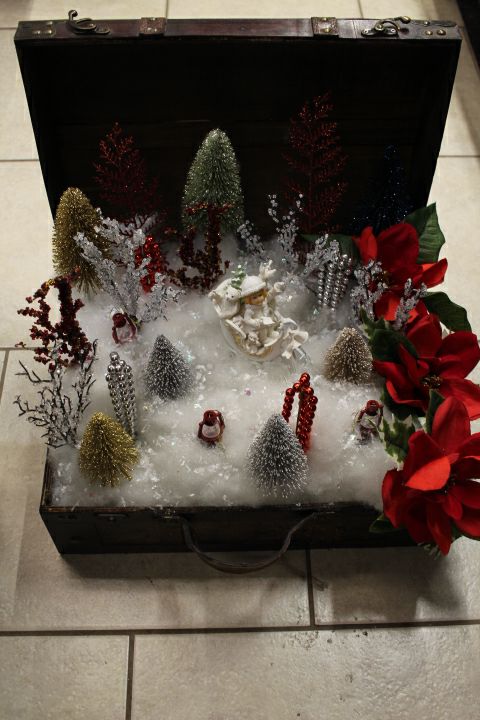 Sleigh Snow Centerpiece in a Wood Trunk