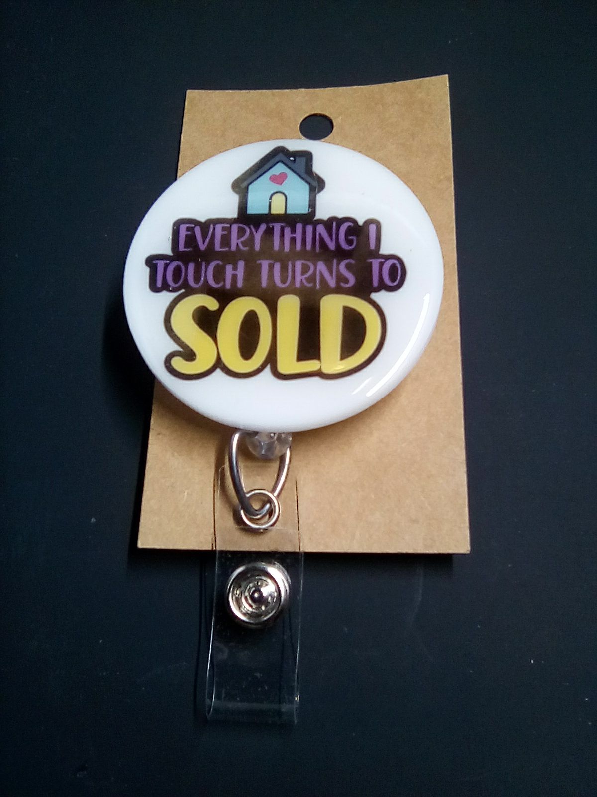 Everything I Touch Badge Reel by June Bugs